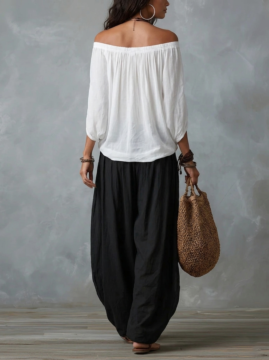 Mara • Conjunto blusa blanca hombros descubiertos y pantalón palazzo negro