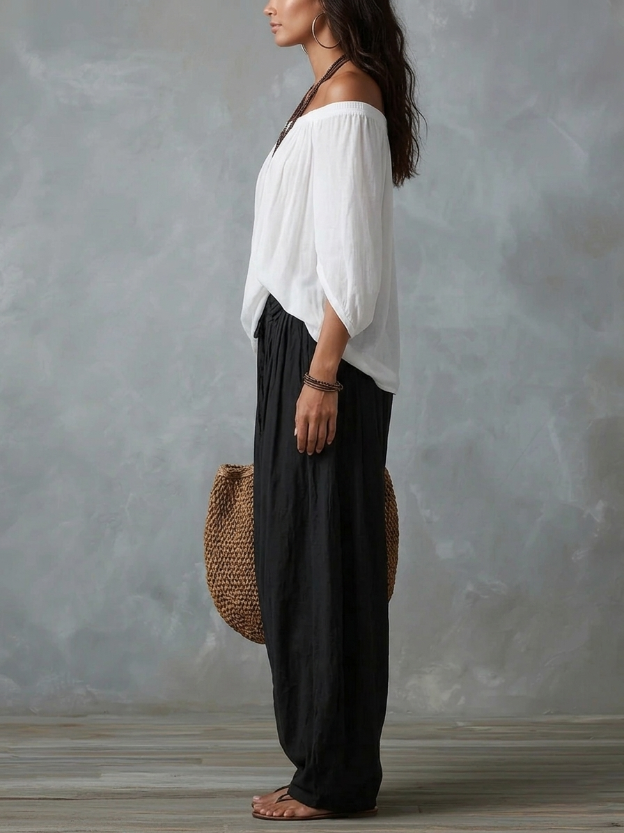 Mara • Conjunto blusa blanca hombros descubiertos y pantalón palazzo negro