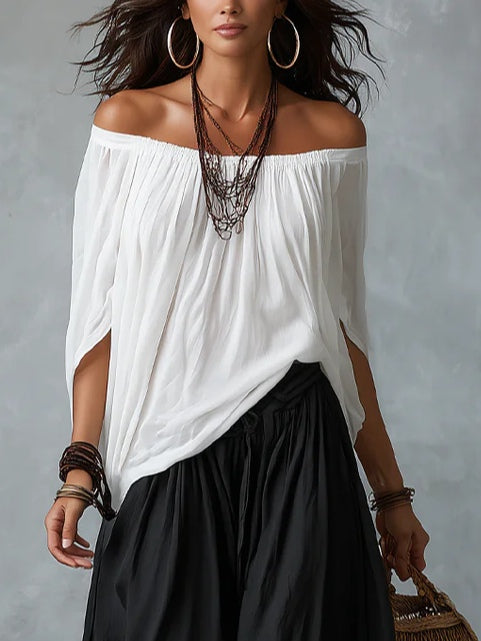 Mara • Conjunto blusa blanca hombros descubiertos y pantalón palazzo negro